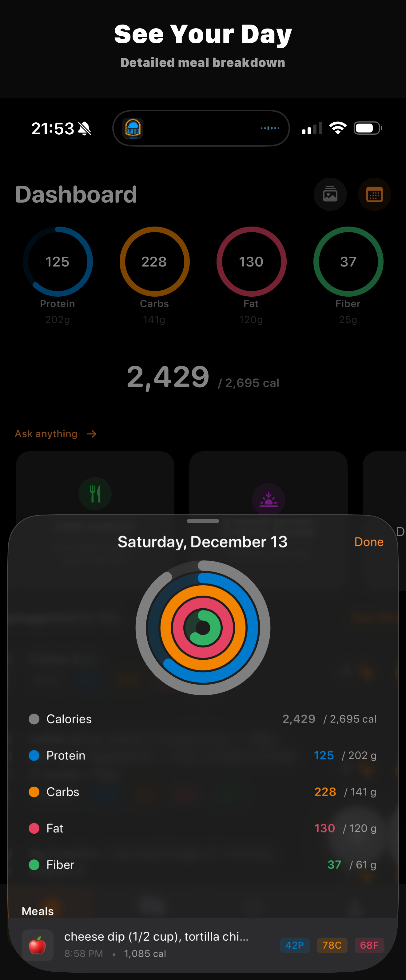 FeedAI day detail with macro rings and meal breakdown